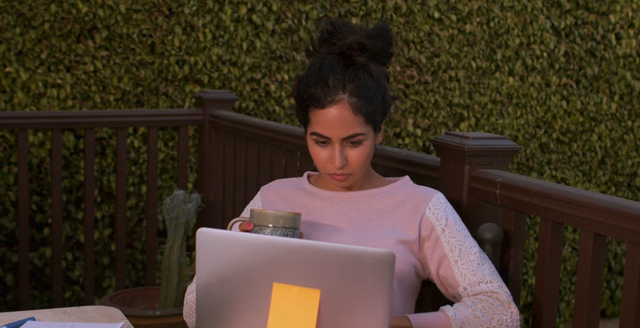 woman on laptop outside